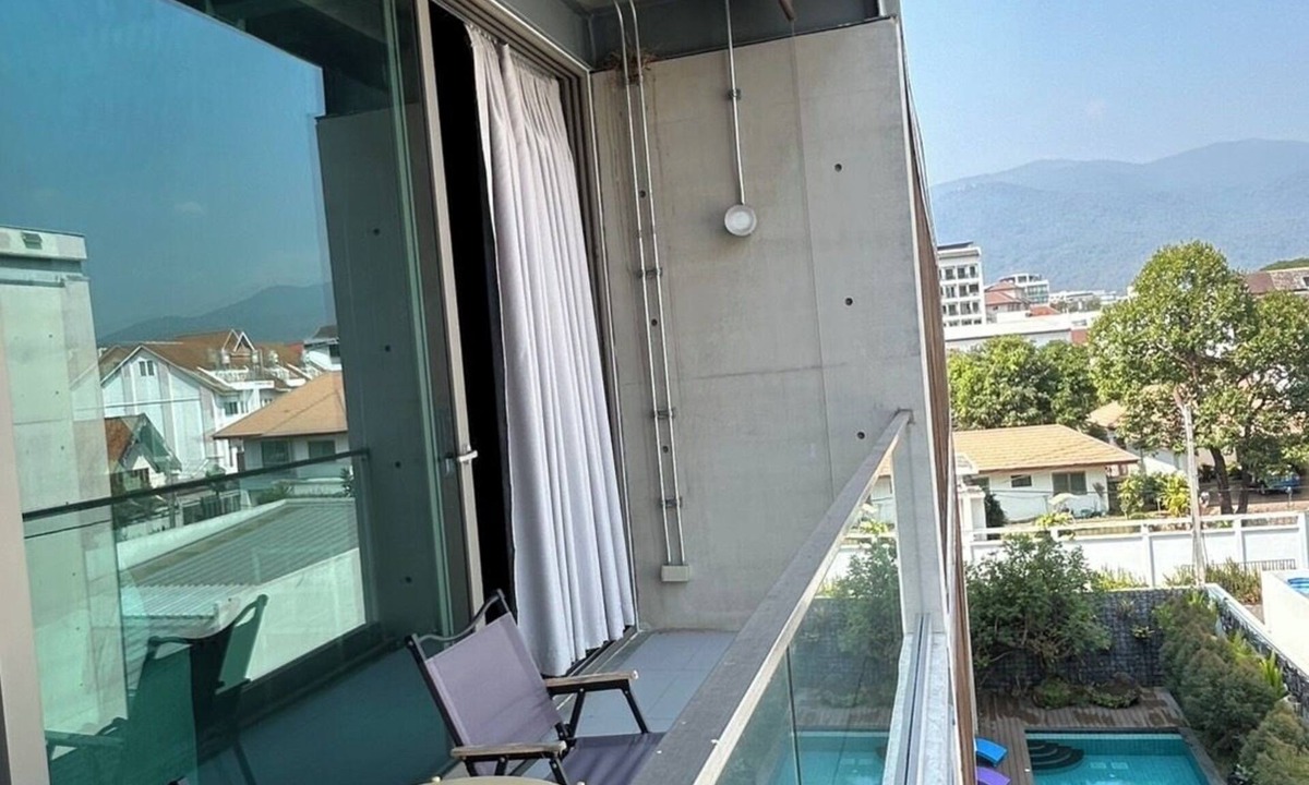 Nimman House | Cozy loft-style rooms, private baths, free Wi-Fi, A/C, and shared spaces.