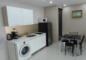 Apartment bedroom + living room.