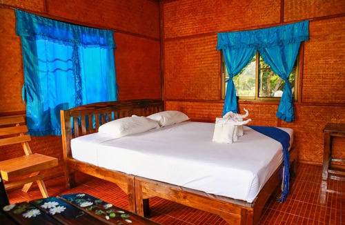 Mae Wang Cabin | a room with rice fields view