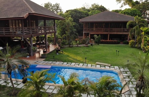 Ban Tak House | Beautiful large garden teak property right on the river in Bantak village.n