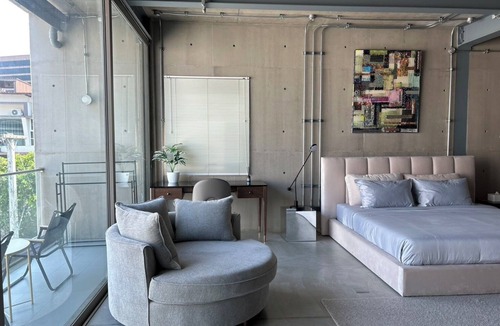 Nimman House | Cozy loft-style rooms, private baths, free Wi-Fi, A/C, and shared spaces.