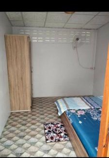 Rayong Apartment | Economy double room with fan only and external bathroom facilities