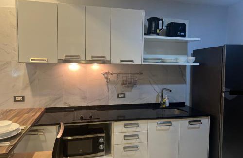 Patong Apartment | EMERALD TERRACE CONDOMINIUM 5th Floor New York Garden view-King Size BED Sleeps 2-by PSR