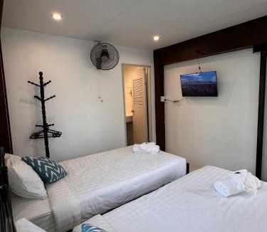 K. Phu Pieng Bed & Breakfast | Luxe Nan Twin Bed Room