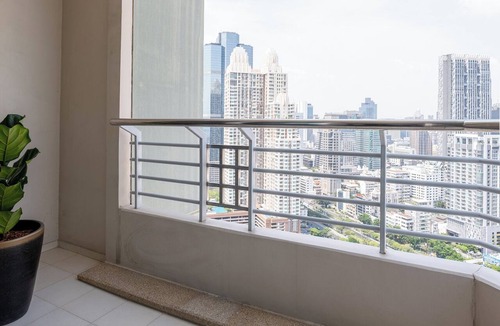 Sathorn Apartment | Midcentury 2BR apt w/WiFi, turntable, game console in CBD Bangkok