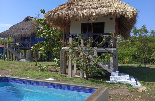 Leon Cottage | Oceanfront Studio Escape with Plunge Pool at Playa Tesoro