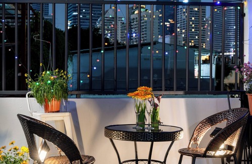 Sathorn House | Spacious 4-bedroom townhome in welcoming Krung Thep Maha Nakhon with AC