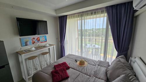 Mai Khao Apartment | Sunset view studio at 777 Beach Condo