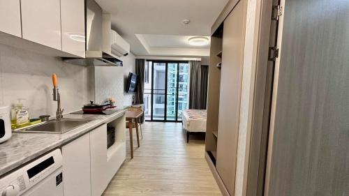 San Sai Apartment | The one condo pool view