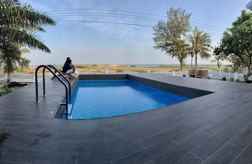 Laem Phak Bia House | Traditional Northern Thai beach house with a swimming pool