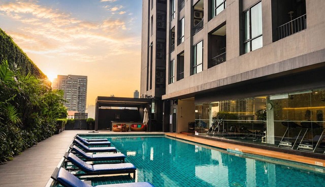 Balcony & Kitchen · Pool, Gym, Fast Wi-Fi