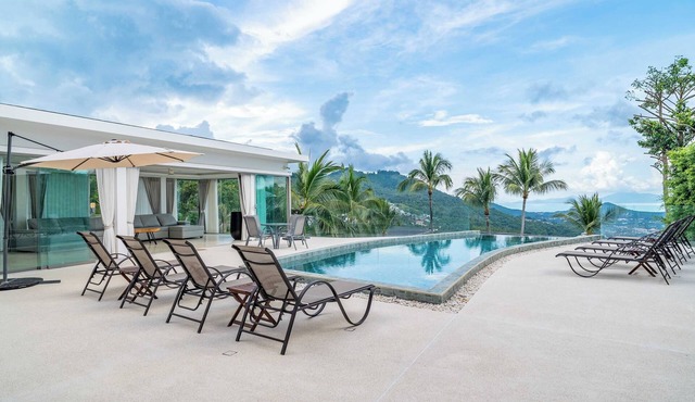 Stunning 6-bedroom retreat with mesmerizing sea views, saltwater infinity pool, and rooftop solarium in Tambon Bo Put