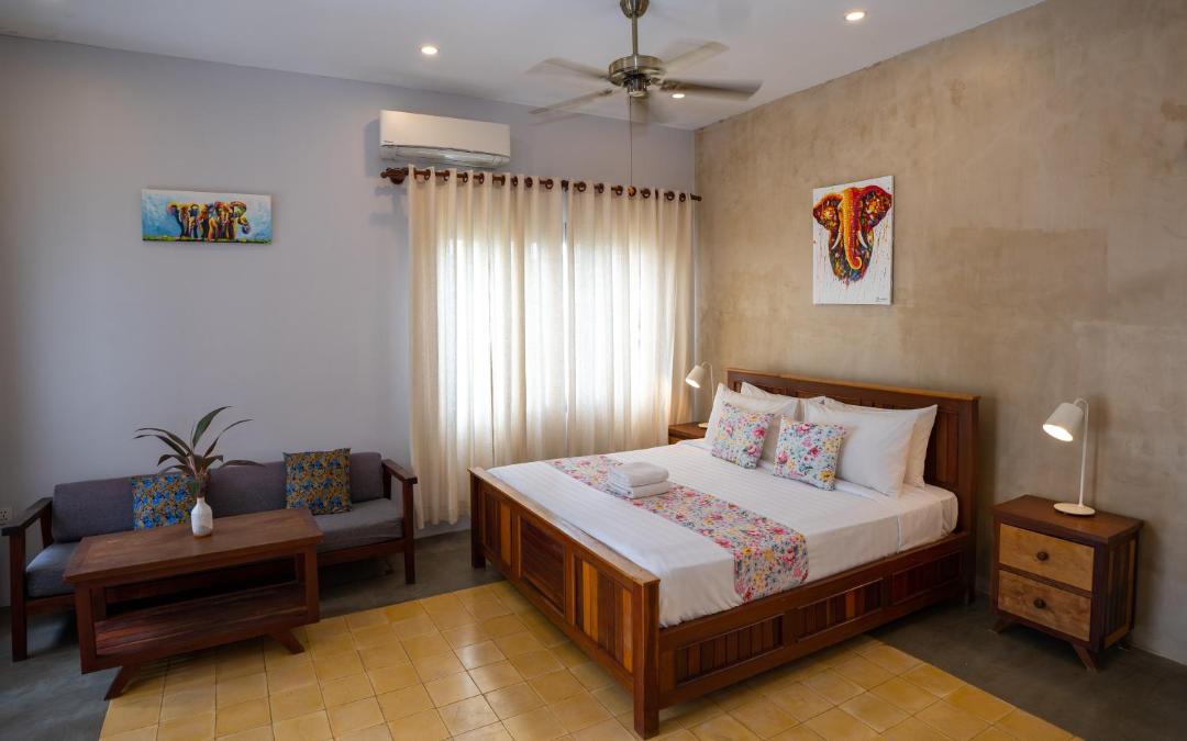 Sangkat Sla Kram Hotel | Isann Suites