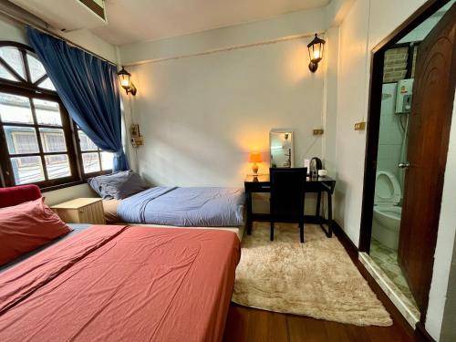 Photo of Bedroom in Wat Sam Phraya