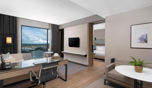 Two-Bedroom Suite with One King Bed and Two Single Beds