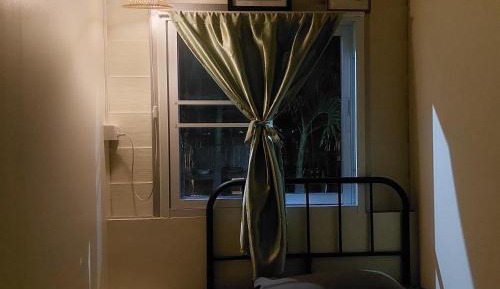 Single Bed in Dormitory Room