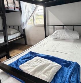 Single Bed in Dormitory Room