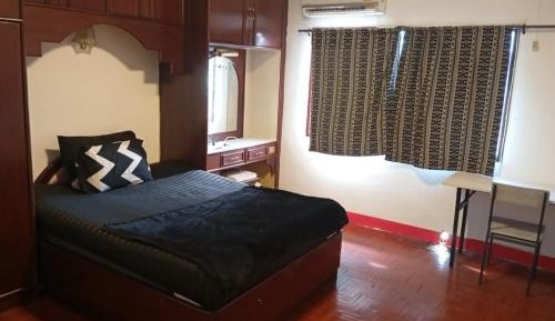 Queen Room with Shared Bathroom