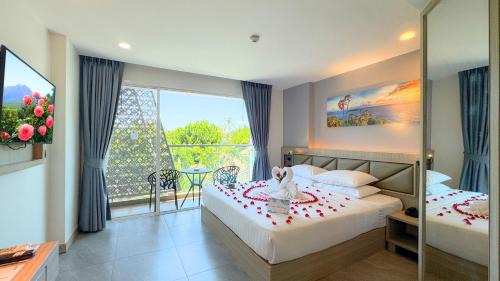 Deluxe King Room with Balcony and City View