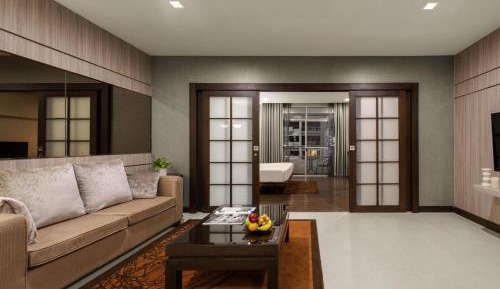 Deluxe King Suite with Living Room and Balcony