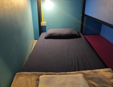 Single Bed in Female Dormitory Room