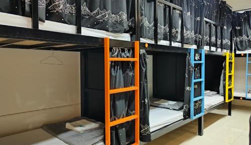 Single Bed in Dormitory Room