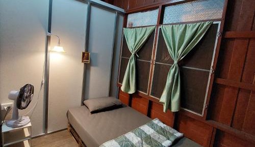Single Bed in Dormitory Room