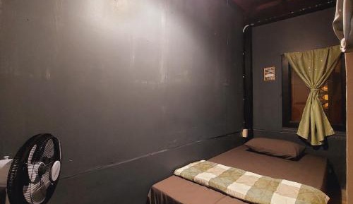 Single Bed in Dormitory Room