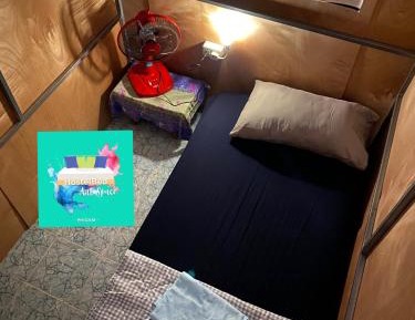 Single Bed in Dormitory Room