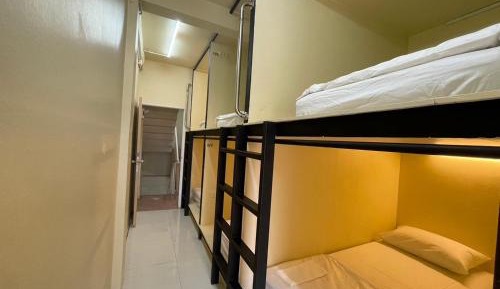 Single Bed in Dormitory Room