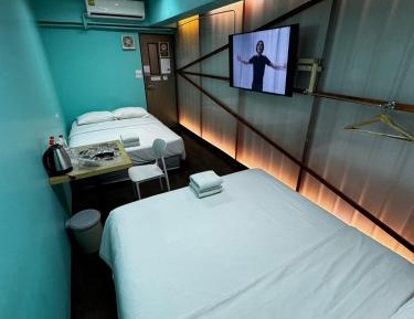 Quadruple Room with Shared Bathroom