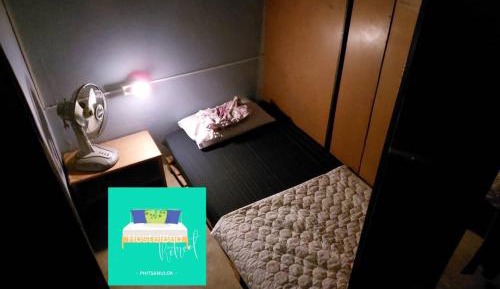 Single Bed in Dormitory Room