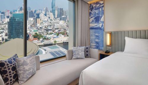 Deluxe Twin Room - Partial River View