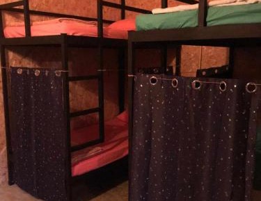 Single Bed in Dormitory Room