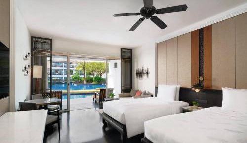 Deluxe Twin Room with One Twin Bed and Sofa Bed - Pool Access