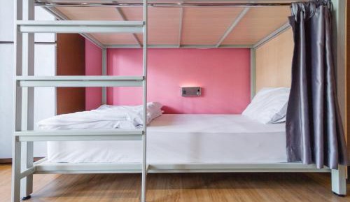 Bed in 8-Bed Ladies Dormitory Room