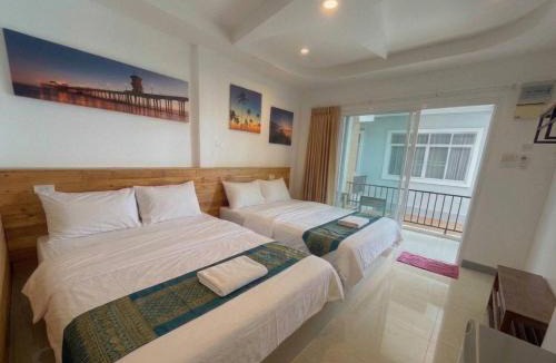 Koh Lan Hotel | เกาะล้านตะวัน บ้านพัก KohLarn Tawan Guesthouse
