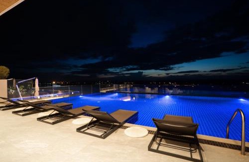 Vientiane Hotel | One Riviera Hotel and Residences