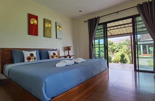 Pua Bed & Breakfast | บ้านมาดีโฮมสเตย์