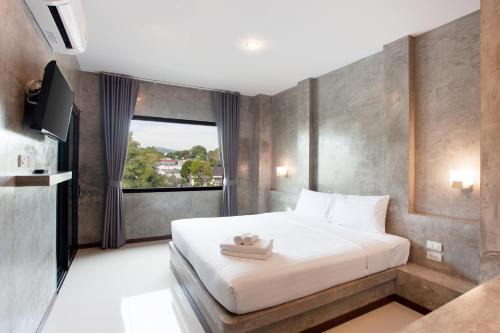 Ritsurin Boutique Hotel - โรงแรมริทสุริน บูติค in Phuket